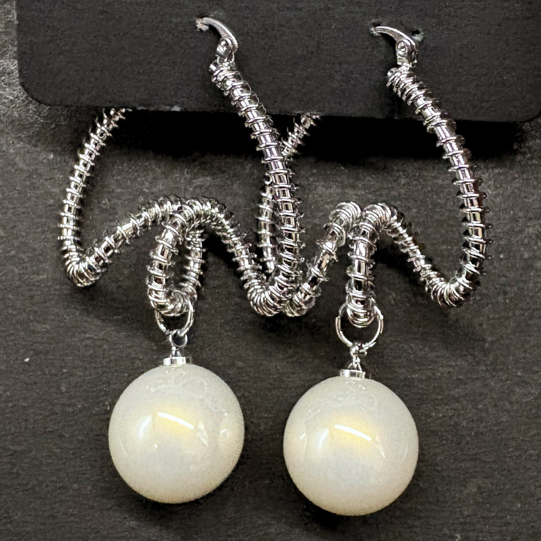 The Silver Serpentine Pearl Drop