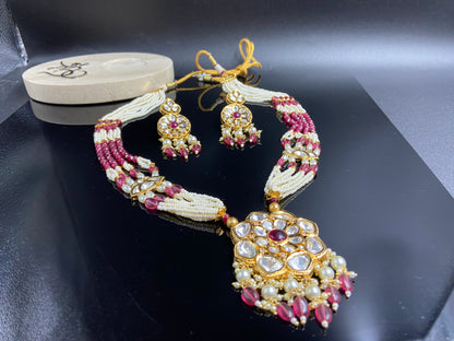 Captivating Polki Flower with Elegant Pearl and Ruby Strings