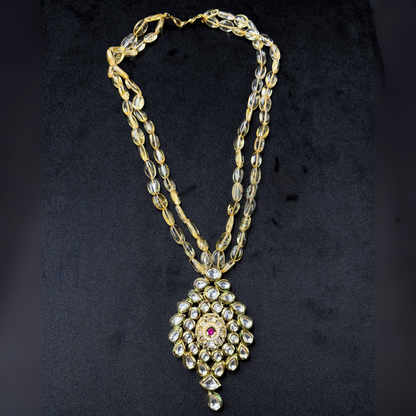 Regal Bloom - Ruby-Set Teardrop Kundan Set