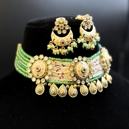 Necklace with Polki Studded Tikdas and Pearl and Jade strings