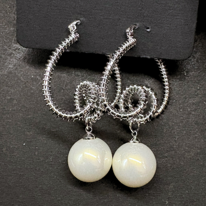 The Silver Serpentine Pearl Drop