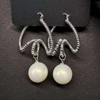 The Silver Serpentine Pearl Drop